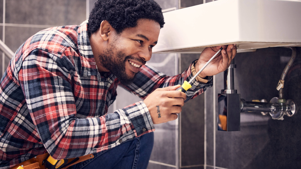 Plumbing contractor at work