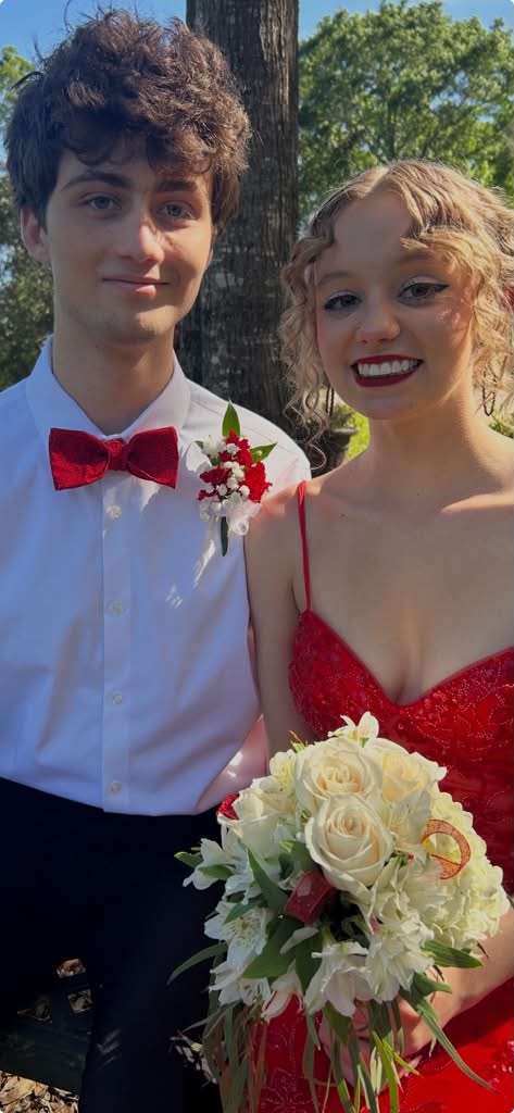 A couple wearing Bowtize bow ties for a formal occasion
