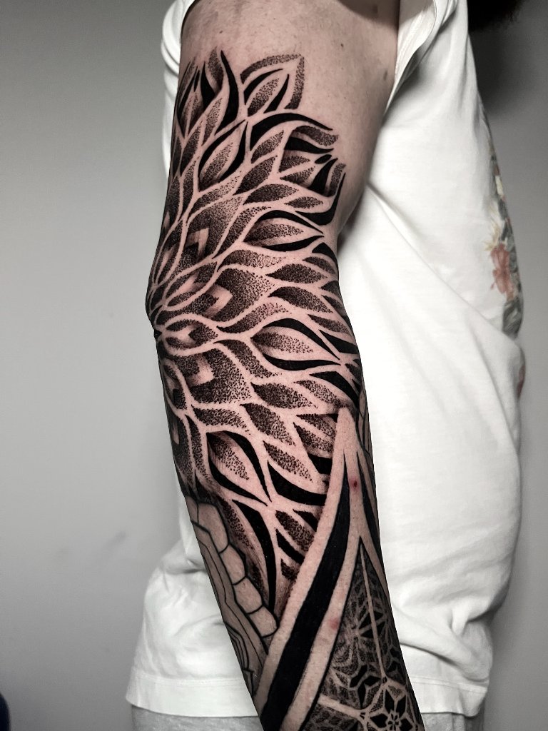 Mandala orgánico en brazo