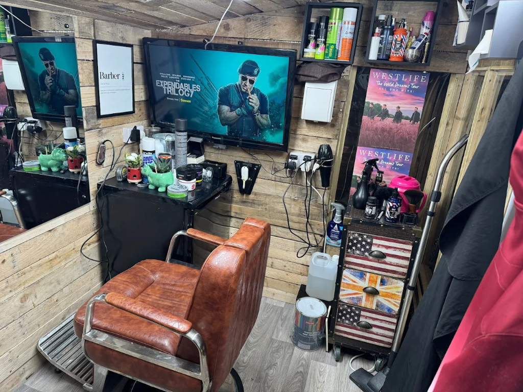 Adam cutting hair at A Grade Barbers