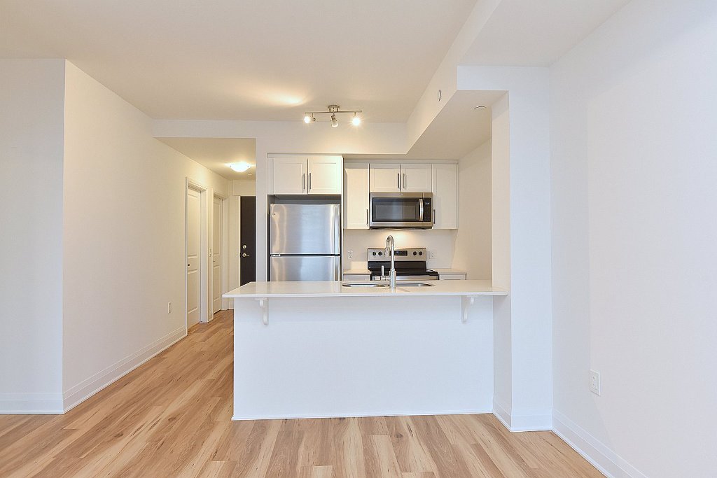 Kitchen overview with stainless appliances