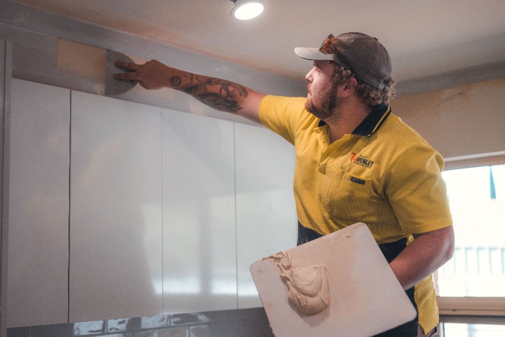 Worker plastering