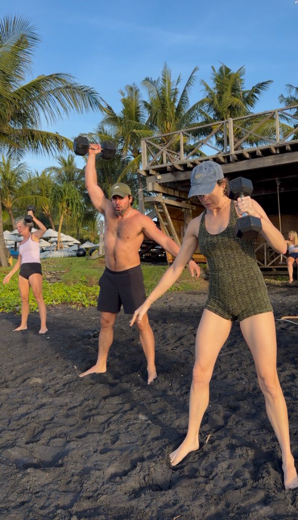 Beach dumbbell training session