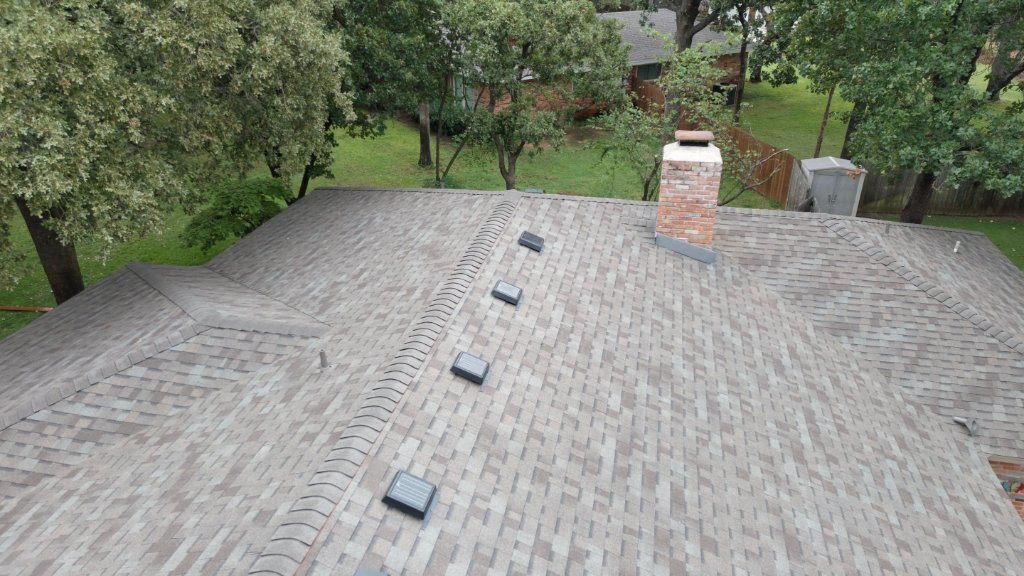 Colleyville Texas Roof Replacement4seasons Solar Attic Vents Raised Ridge Cap - Colleyville Roofing project photo by Becker Roofing and Exteriors