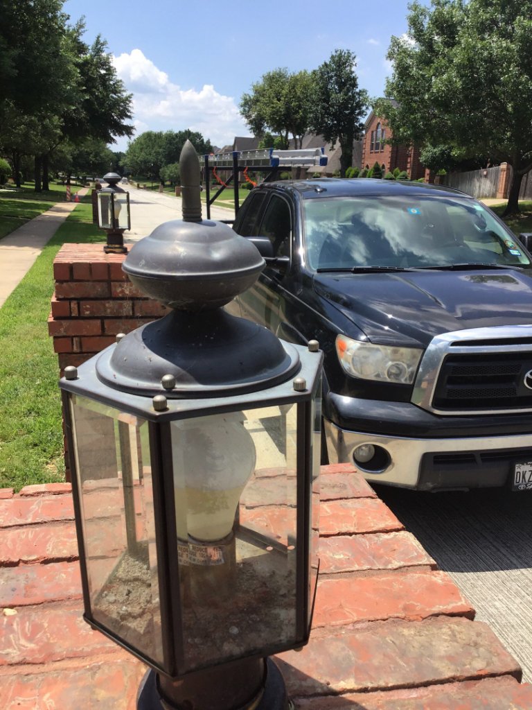 Colleyville Texas Exampleof Hail Damageto Light Fixture - Colleyville Roofing project photo by Becker Roofing and Exteriors