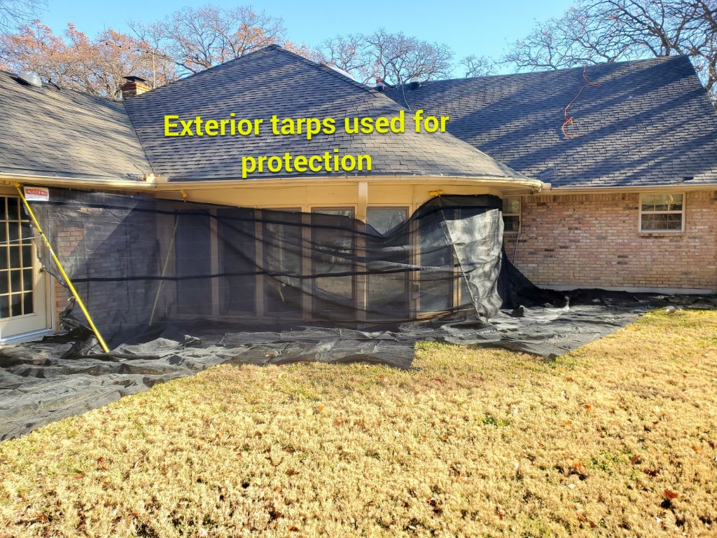 Colleyville Texas During Roof Replacement Protecting Windows During Install - Colleyville Roofing project photo by Becker Roofing and Exteriors