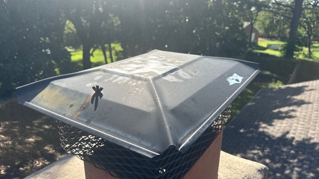 Colleyville Texas Exampleof Hail Damageto Chimney Cap - Colleyville Roofing project photo by Becker Roofing and Exteriors