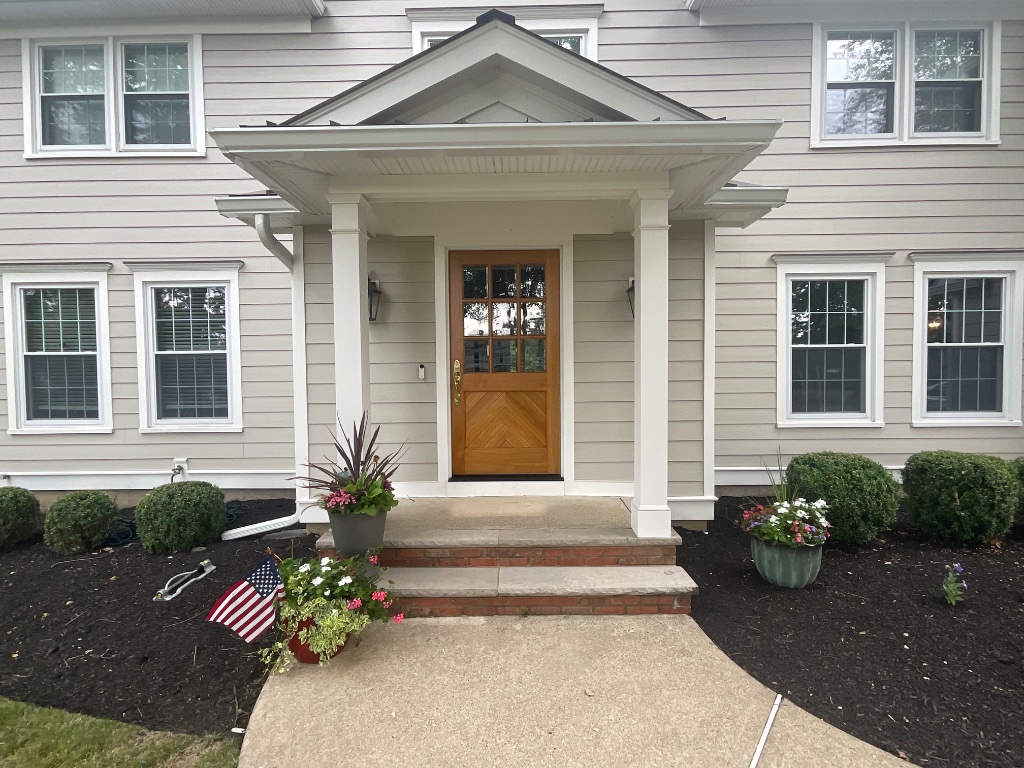 Refinished wooden front entry door