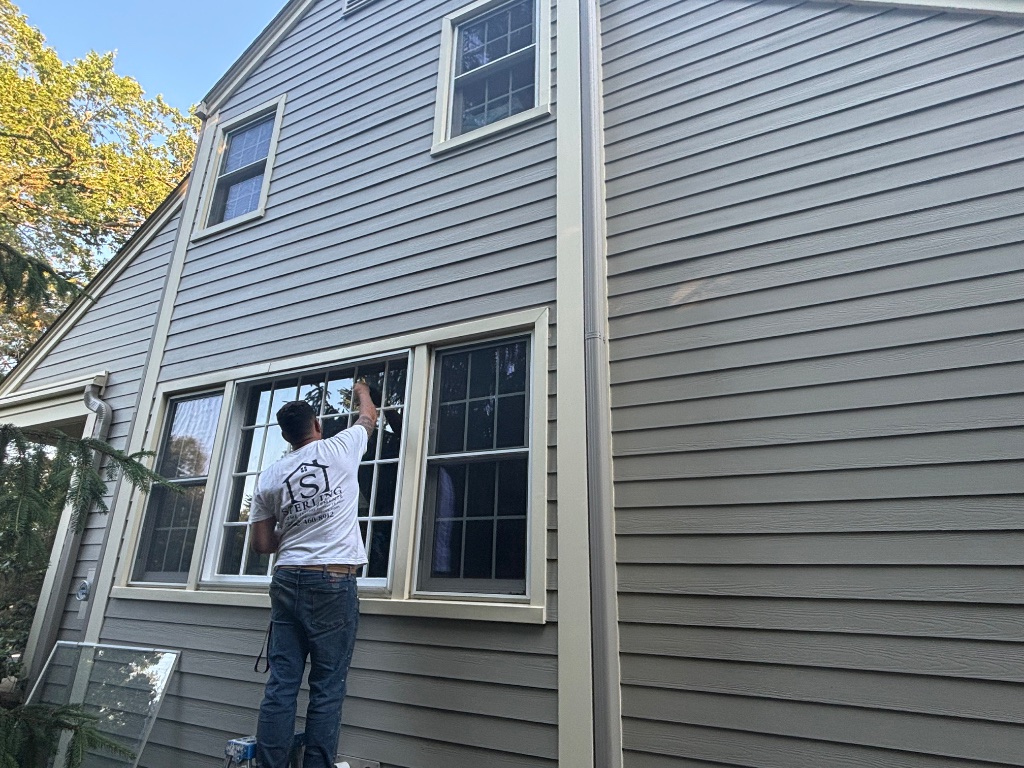 Window trim painting on exterior