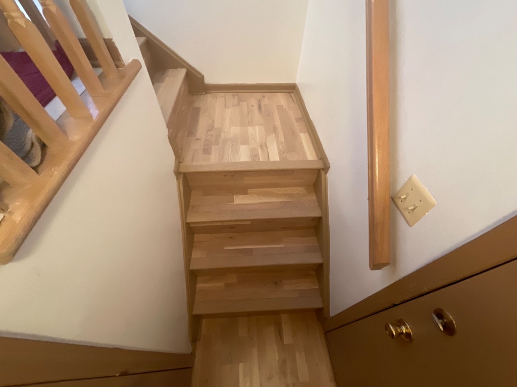 New hardwood stair landing detail