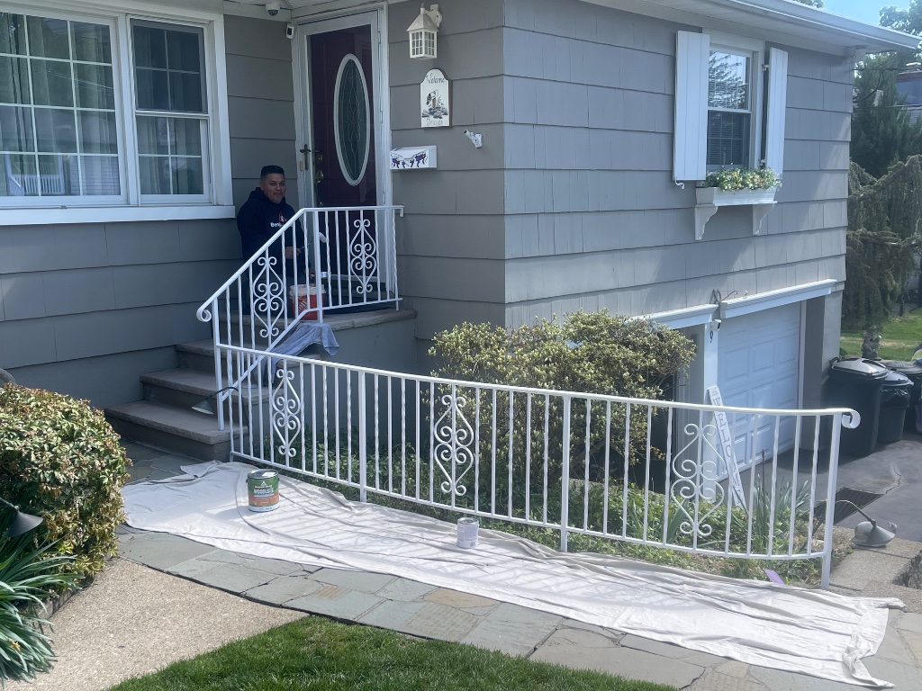 Exterior railing painting close-up