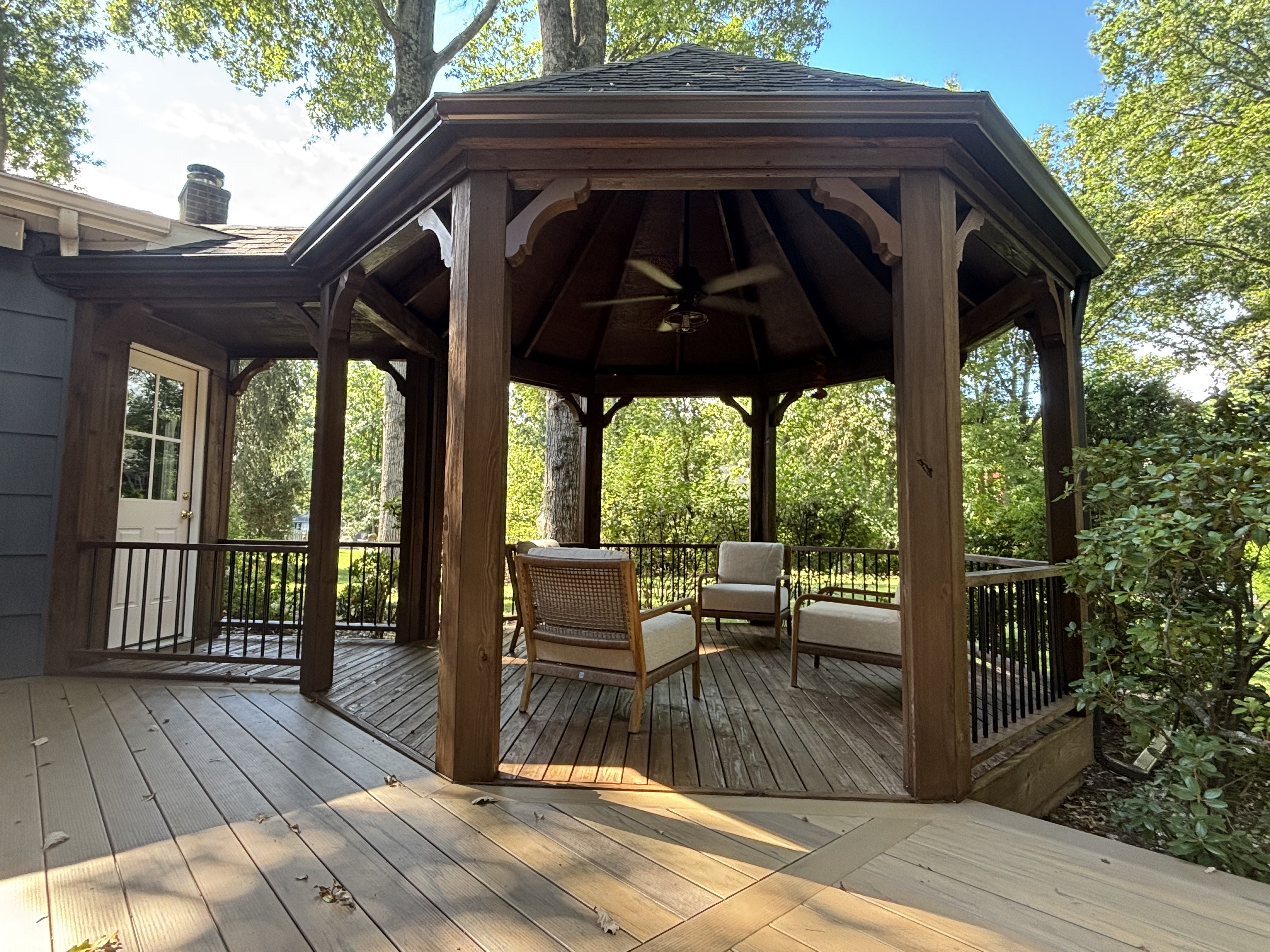 Octagonal gazebo with composite deck and herringbone inlay