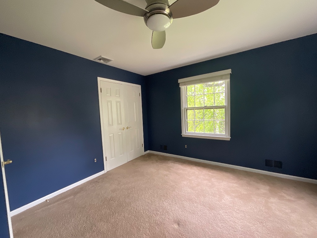 Navy blue bedroom second angle