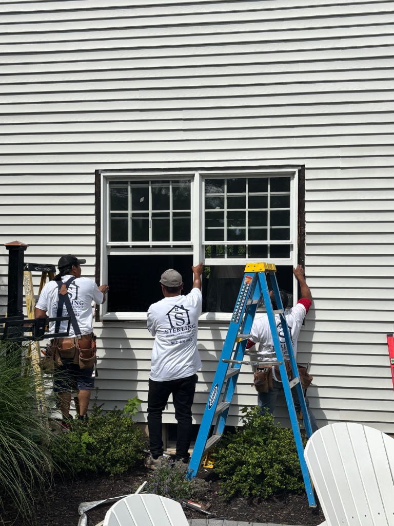 Sterling team installing new windows