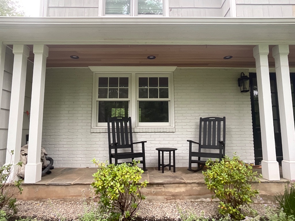 Painted brick porch with new windows