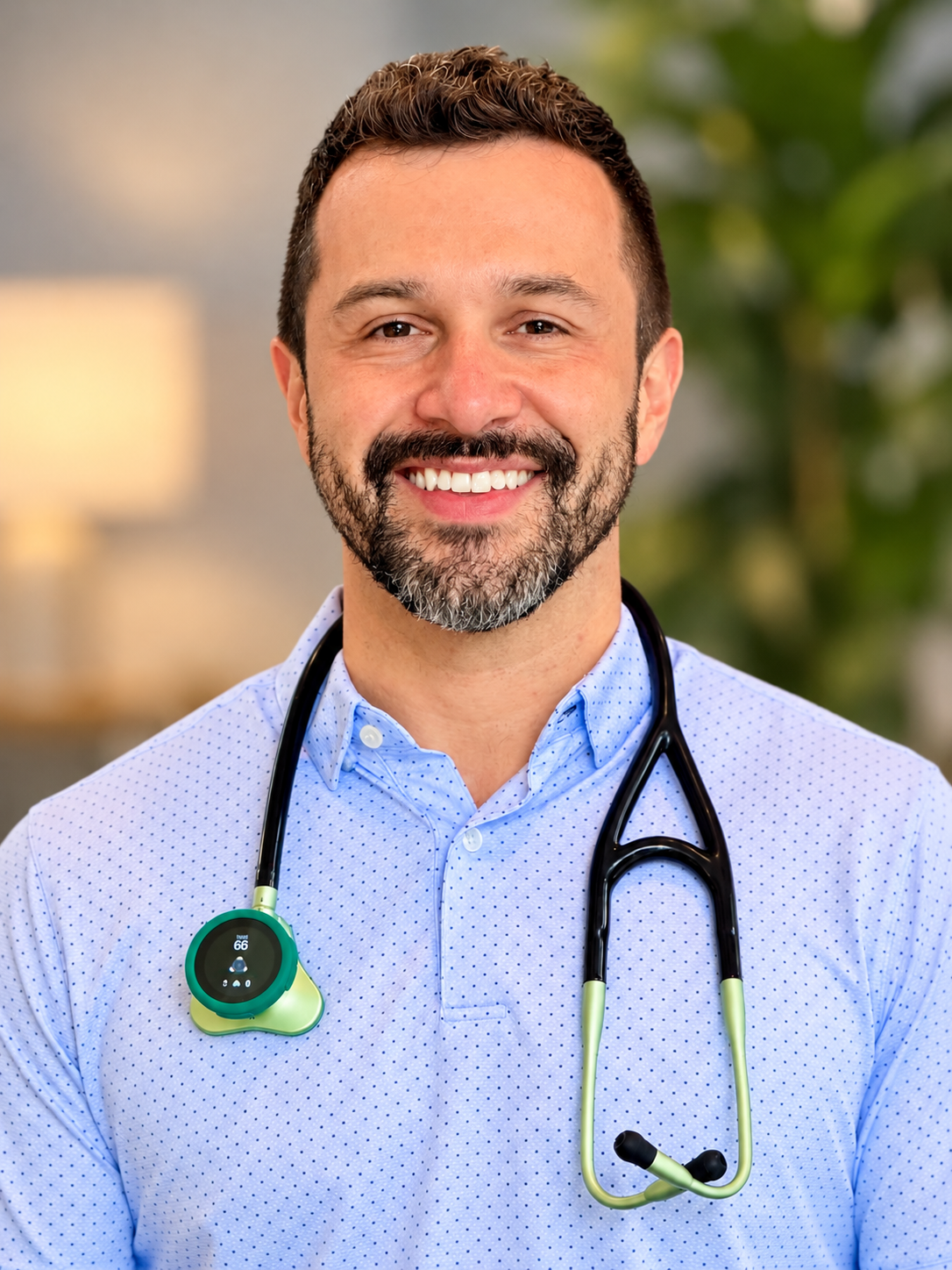 Dr. Juan Carlos Venis, family physician, wearing a stethoscope at INcircle Health