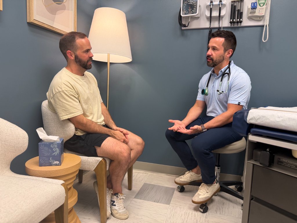 Dr. Venis in consultation with a patient at INcircle Health