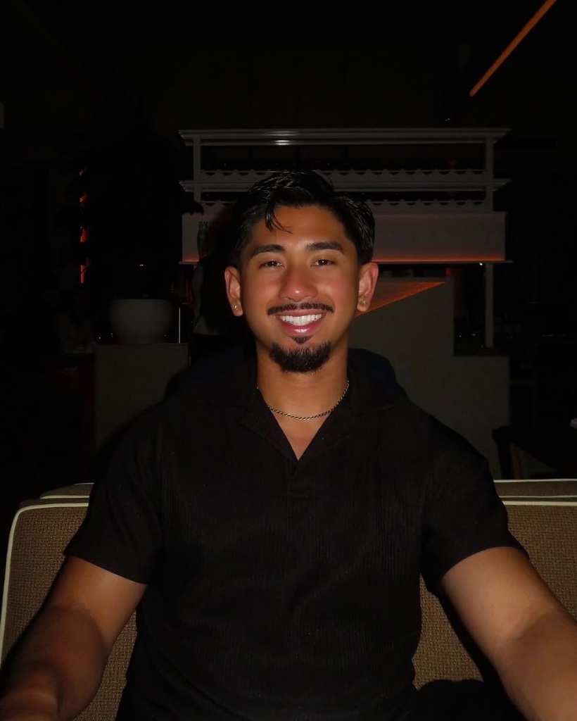 EJ Escobedo — modern barber specialising in skin fades and men's haircuts at Dina's Hair Vogue West Vancouver
