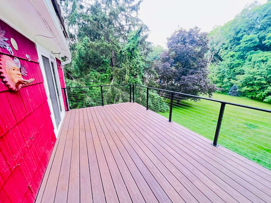 Composite deck with cable railing complete in Mount Kisco