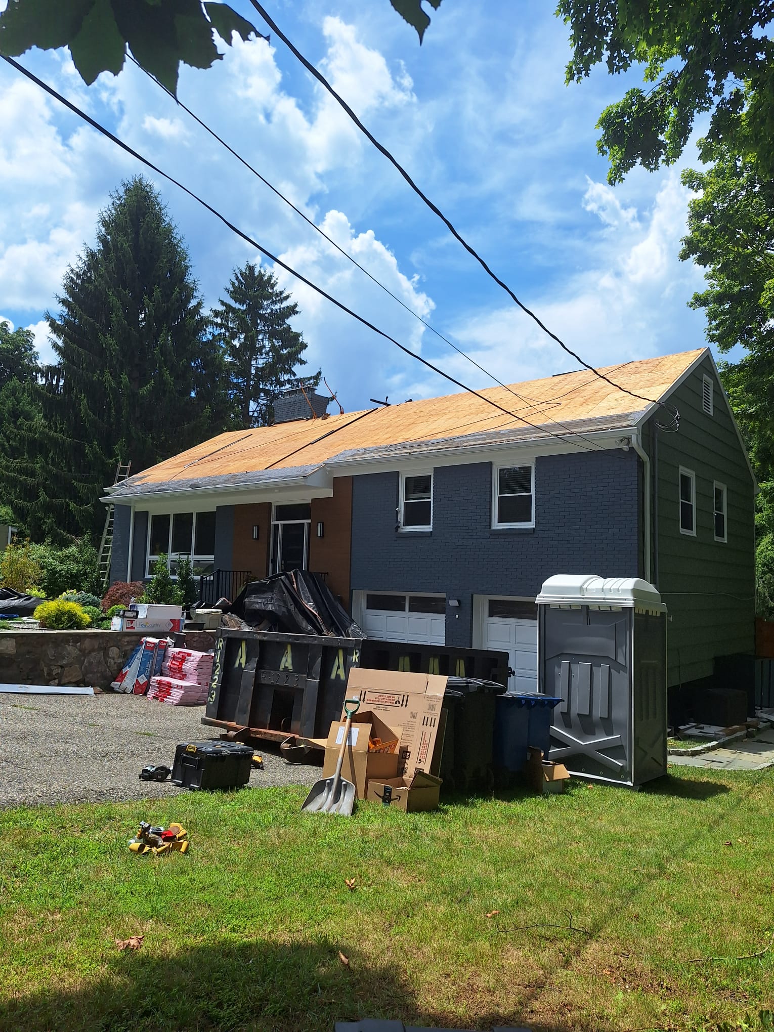 Full roof tear-off with deck exposed in Mount Kisco
