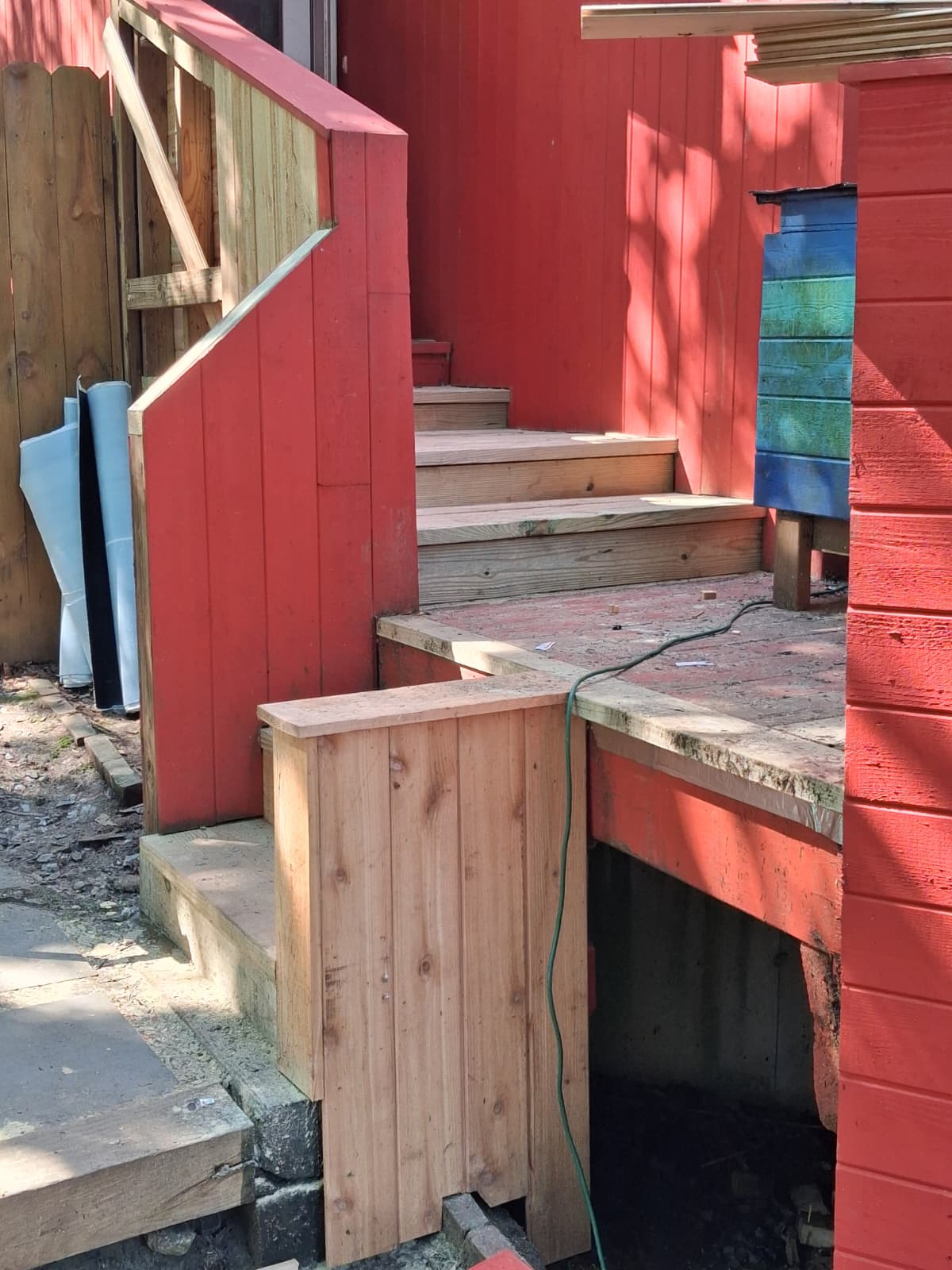Deck stairs finished with new treads, skirting and railing in Hartsdale
