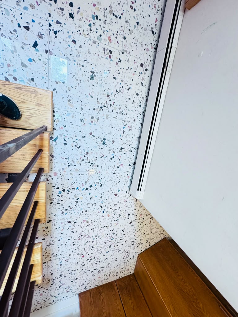 Terrazzo tile floor — finished landing and stair transition project in Hartsdale