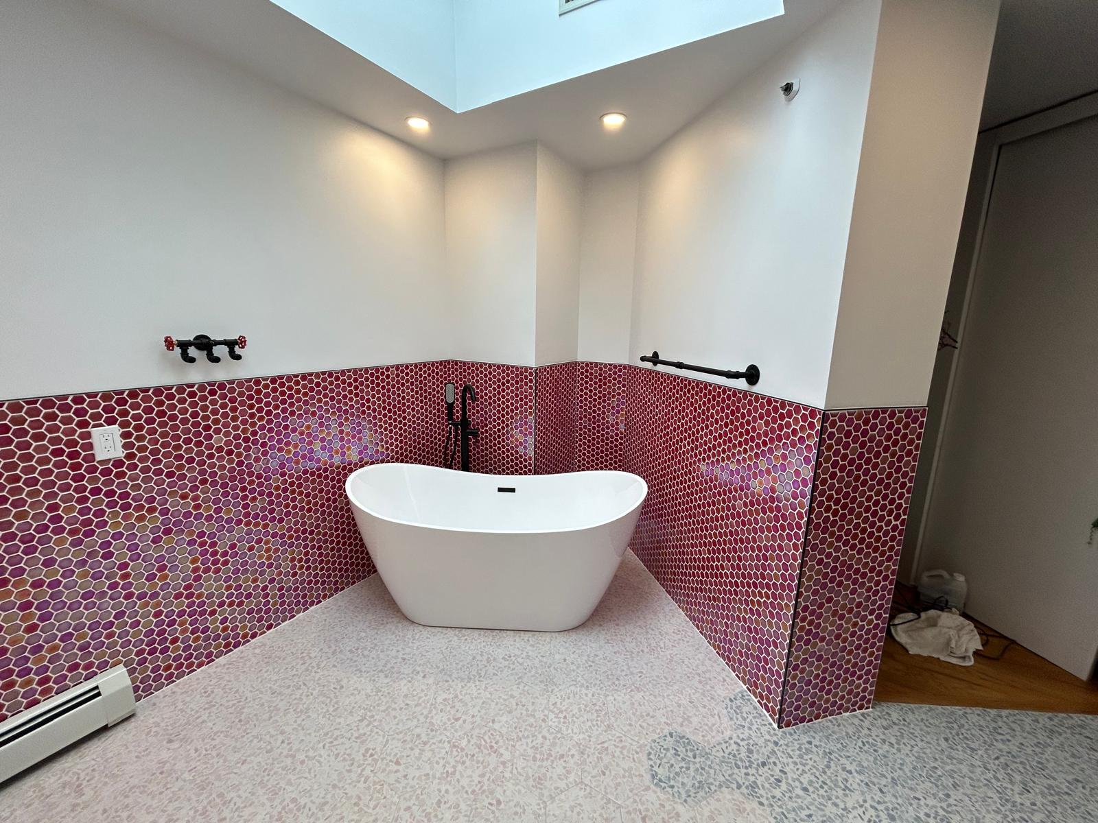 Master bathroom remodel — freestanding tub at the red tile wall in Hartsdale