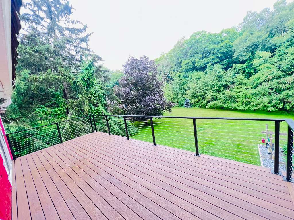 Completed deck and railing over the backyard in Mount Kisco