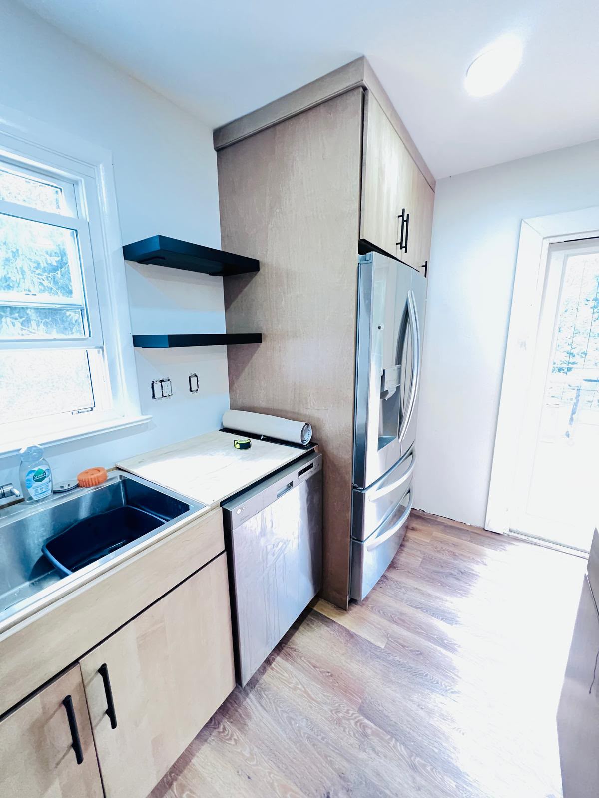 Sink, dishwasher and refrigerator enclosure complete in Mount Kisco