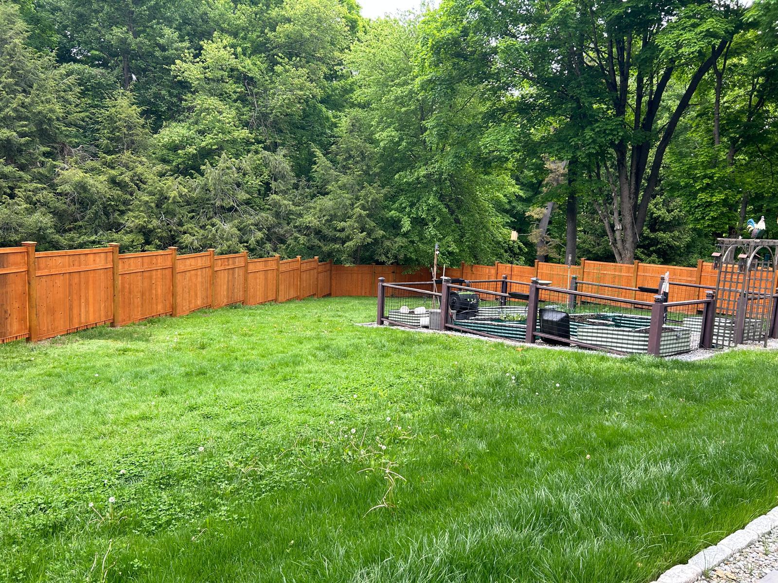 Backyard privacy fence completed along the boundaries in Mount Kisco