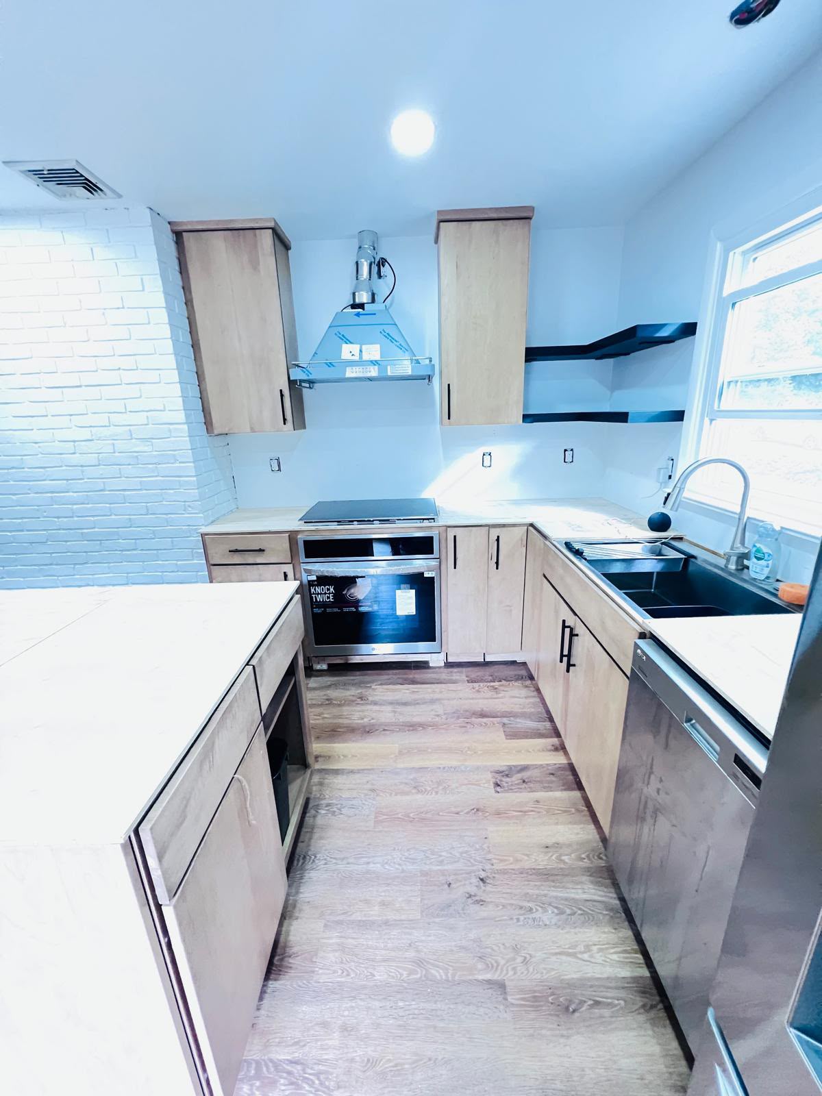 Range, hood and sink wall set with counters pending in Mount Kisco