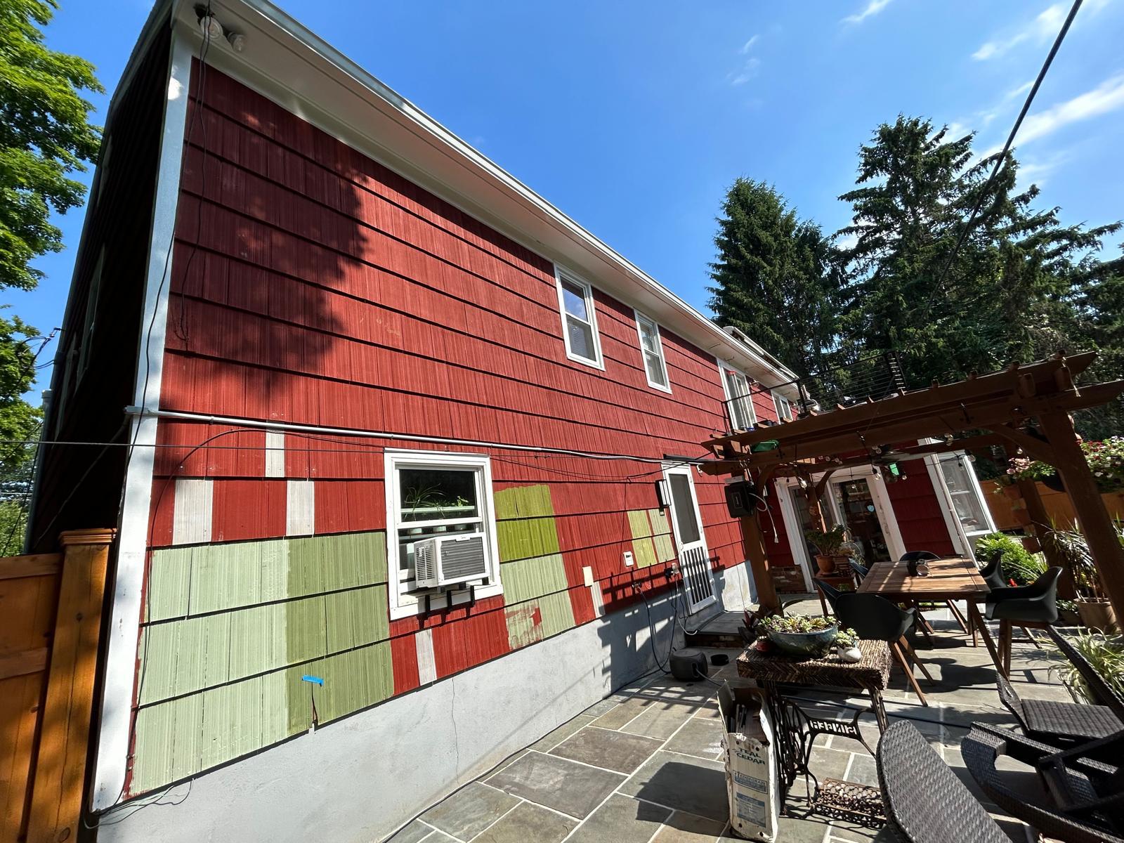 Siding replacement from red to green shake in Mount Kisco