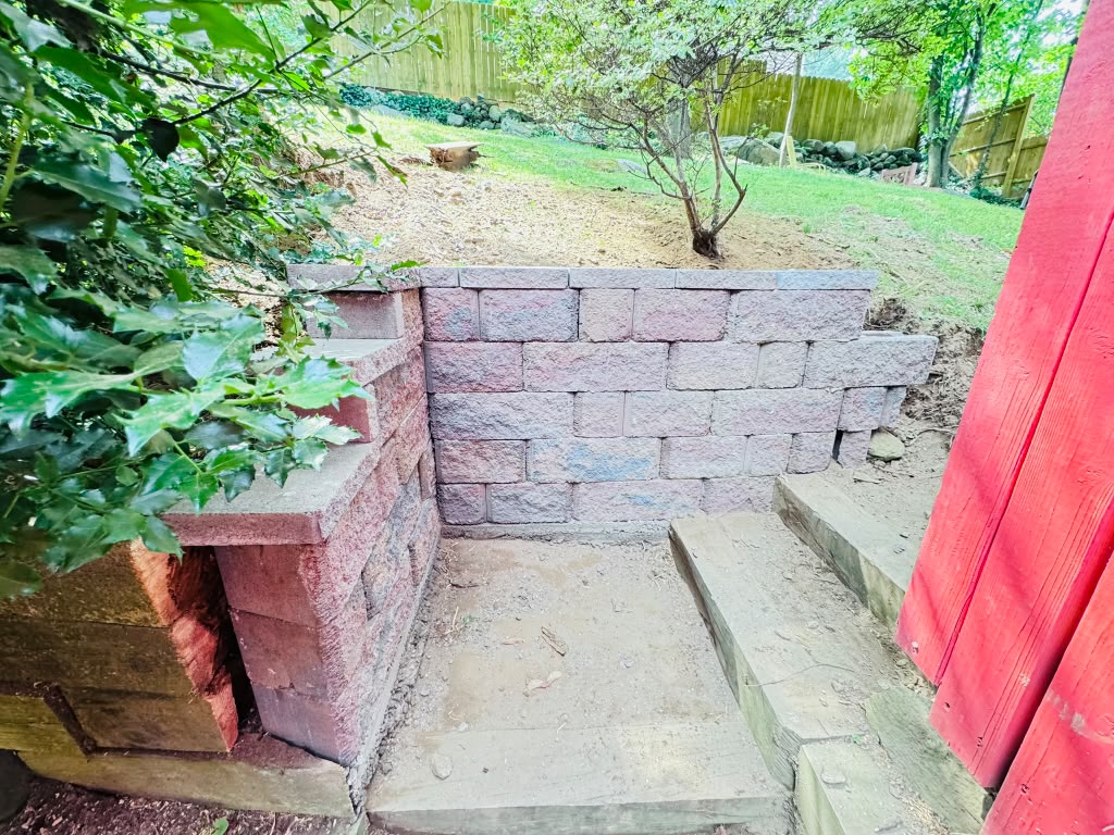 Retaining wall — new masonry wall with timber garden steps in Hartsdale