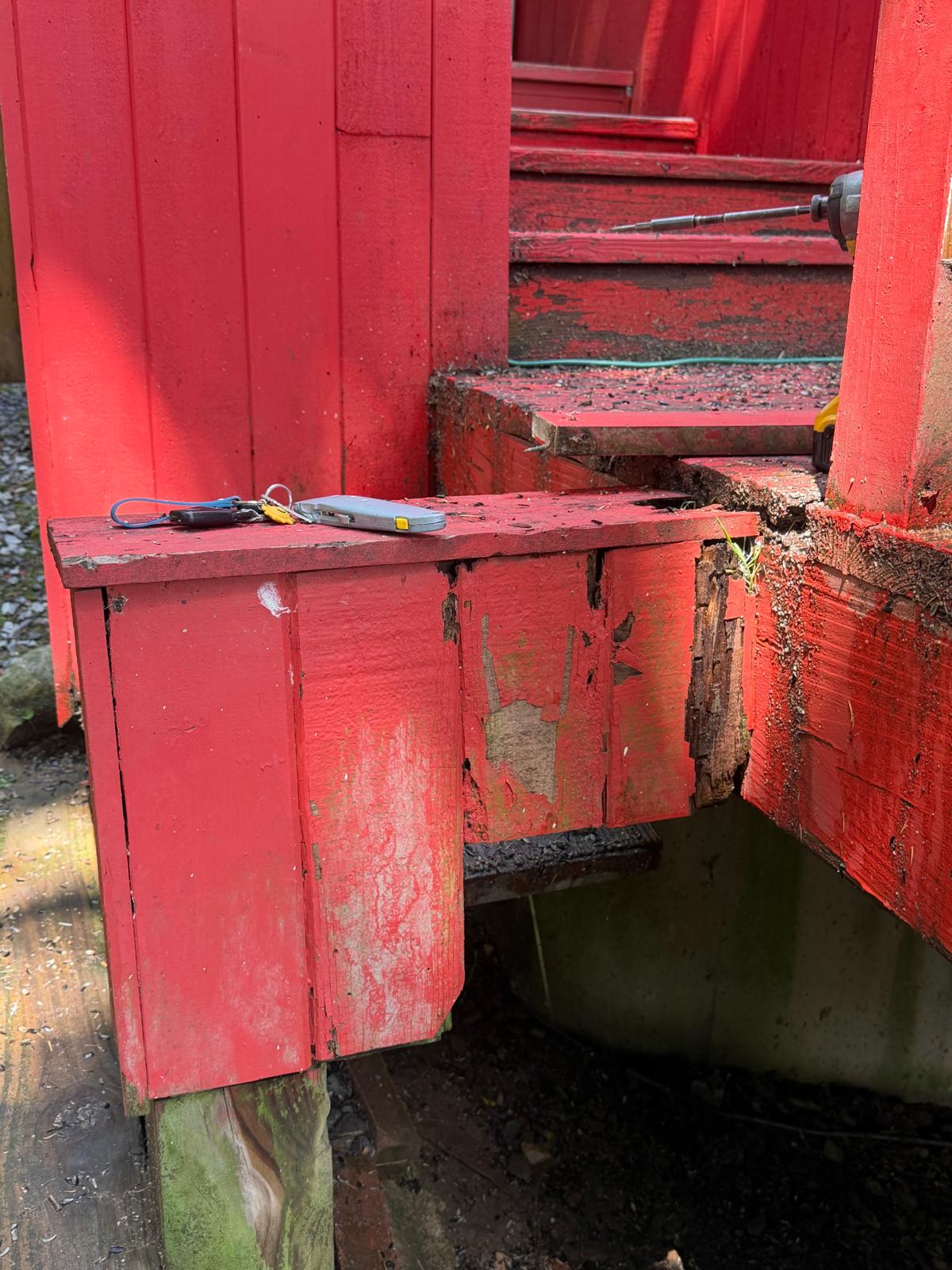 Deck stair stringer rot exposed before new framing in Hartsdale