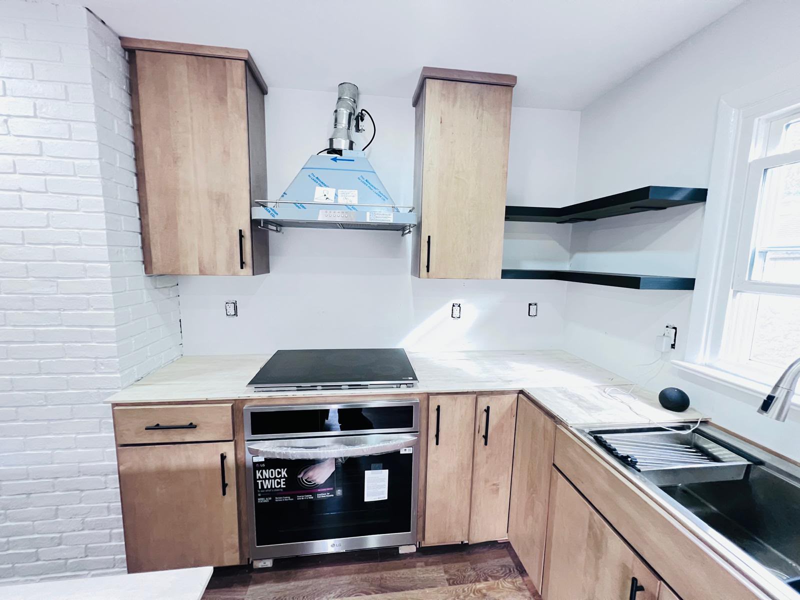 Cooking and sink wall laid out for the new kitchen in Mount Kisco
