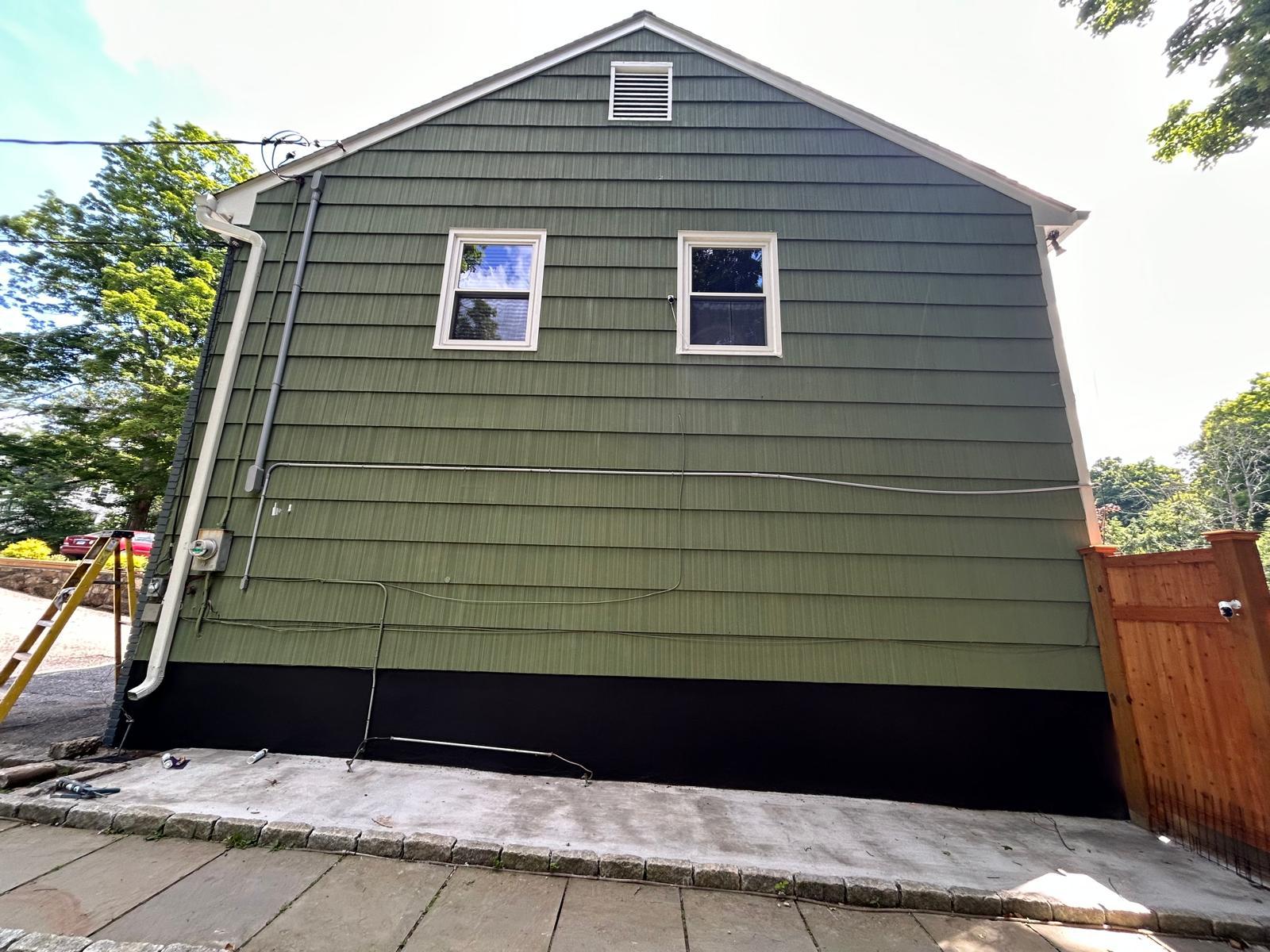 Gable end re-sided in green shake in Mount Kisco