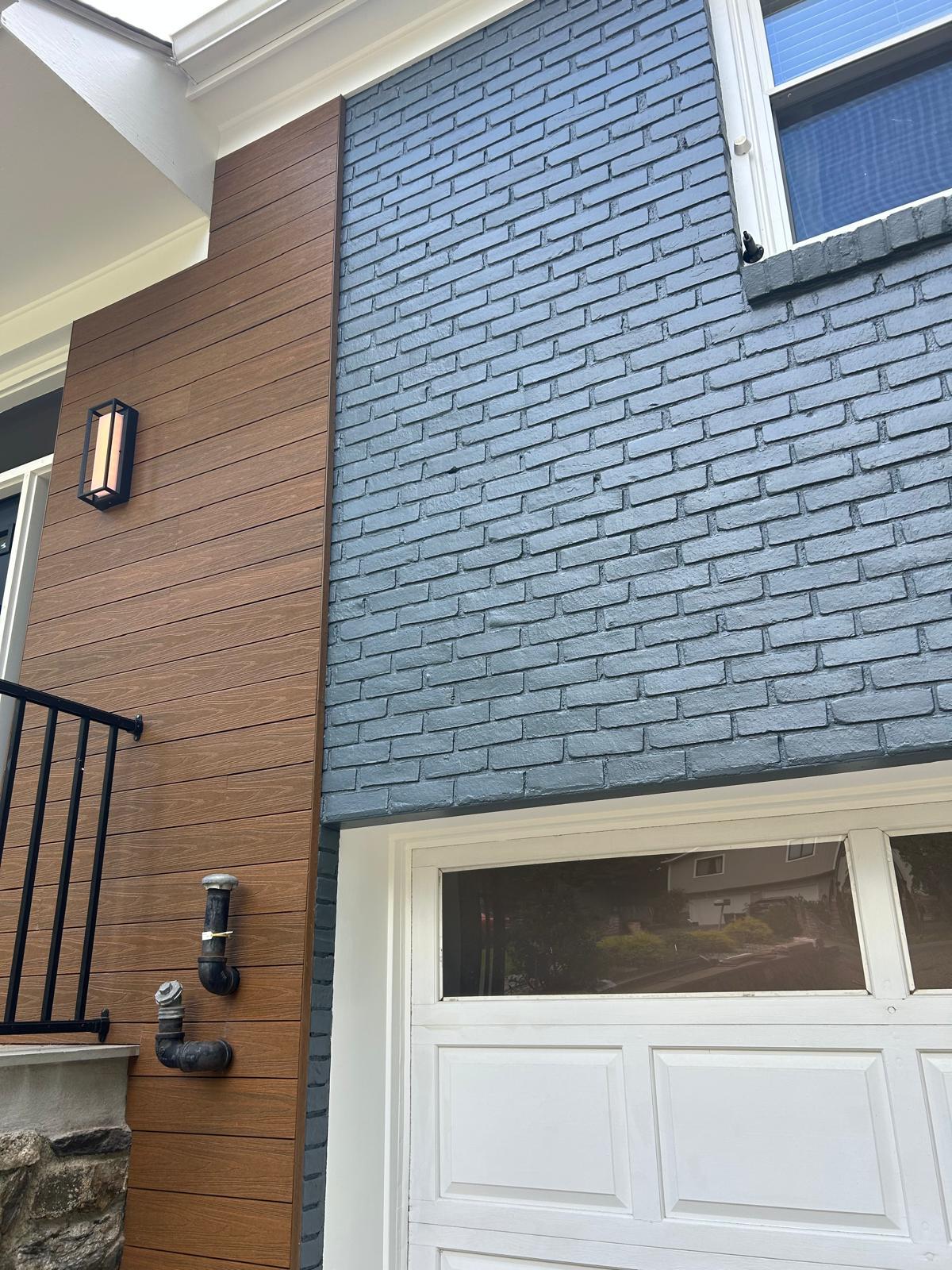 Garage door with wood accent paneling in Mount Kisco