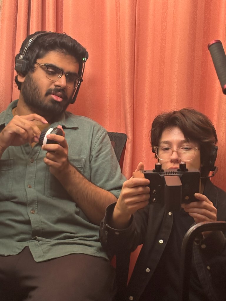 DP and AC reviewing the shot