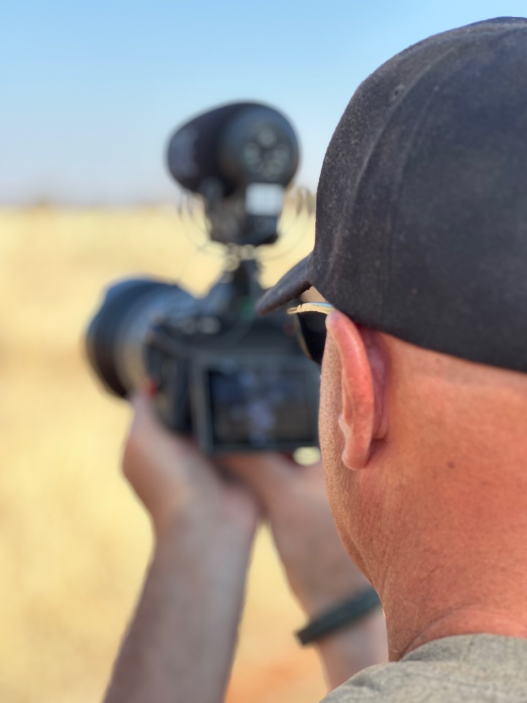 Veteran with camera in the bush