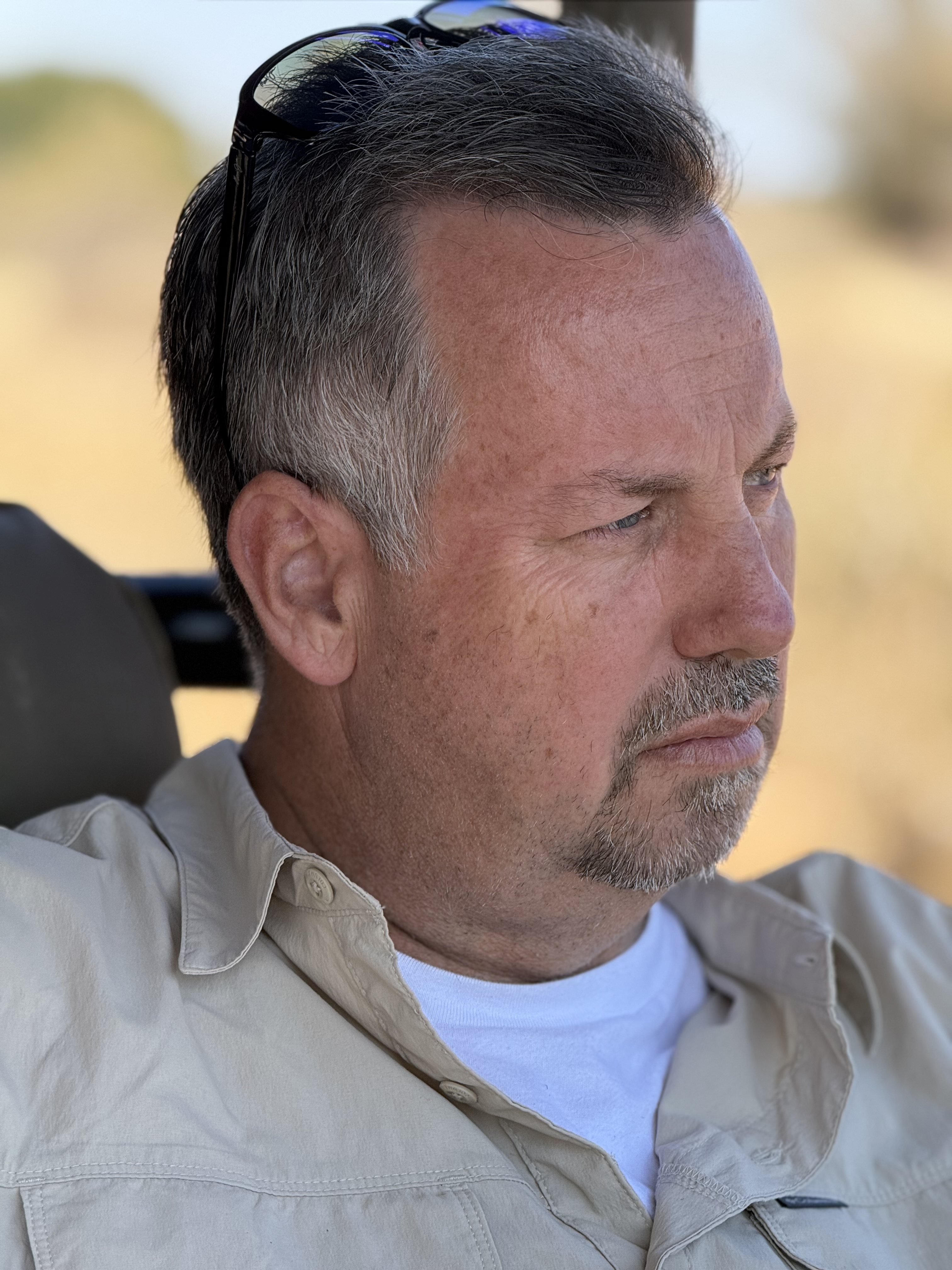 Soldiers on Safari veteran in profile against the savanna