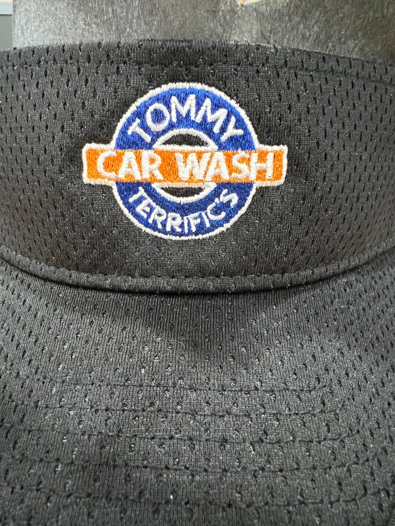 Tommy Terrific's Car Wash logo embroidered on a black visor by Sew Suite