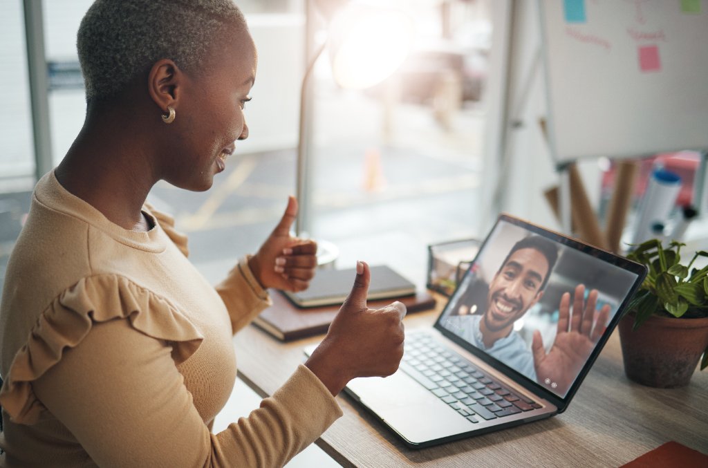 Advisor on video call with student