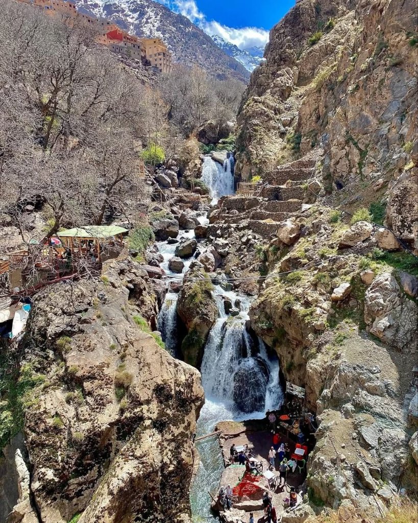 A waterfall cascading through a rocky canyon in the High Atlas Mountains near Imlil