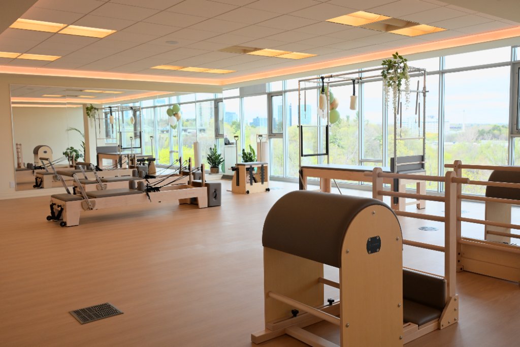 Premium Pilates studio with reformers and natural light