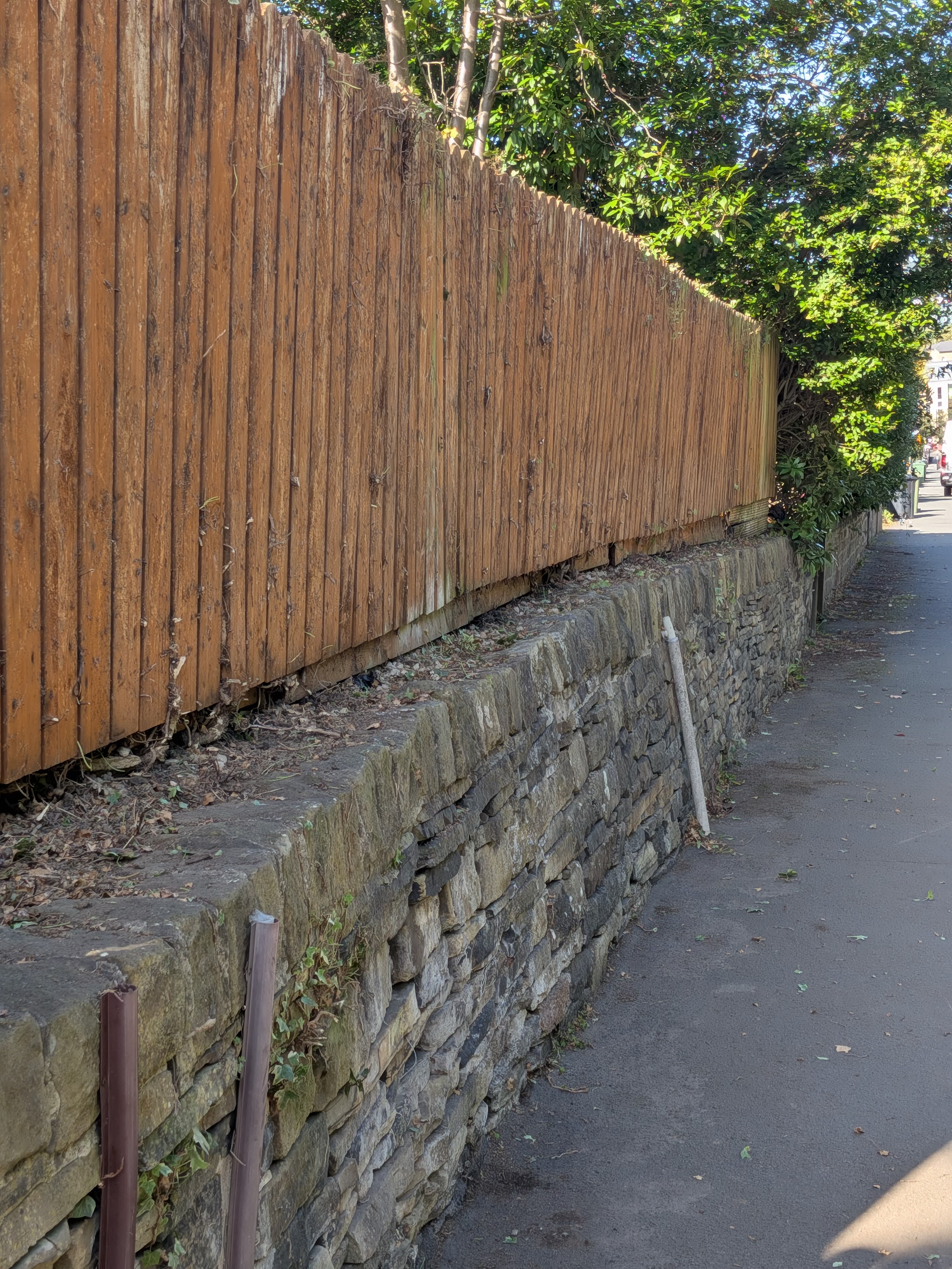 Fence & Stone Retaining Wall — West Yorkshire