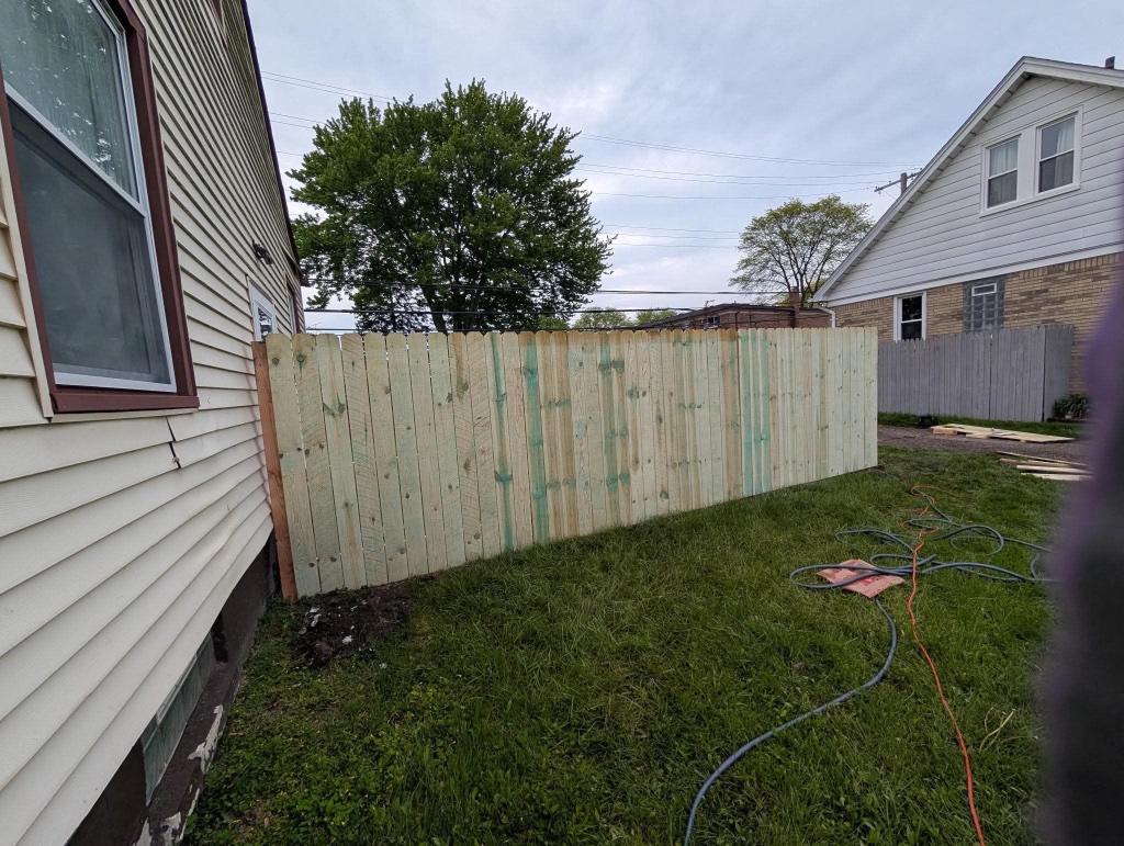 Freshly built wooden privacy fence