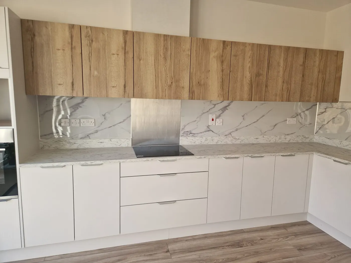 White and Grey Wall Panel installed in the kitchen