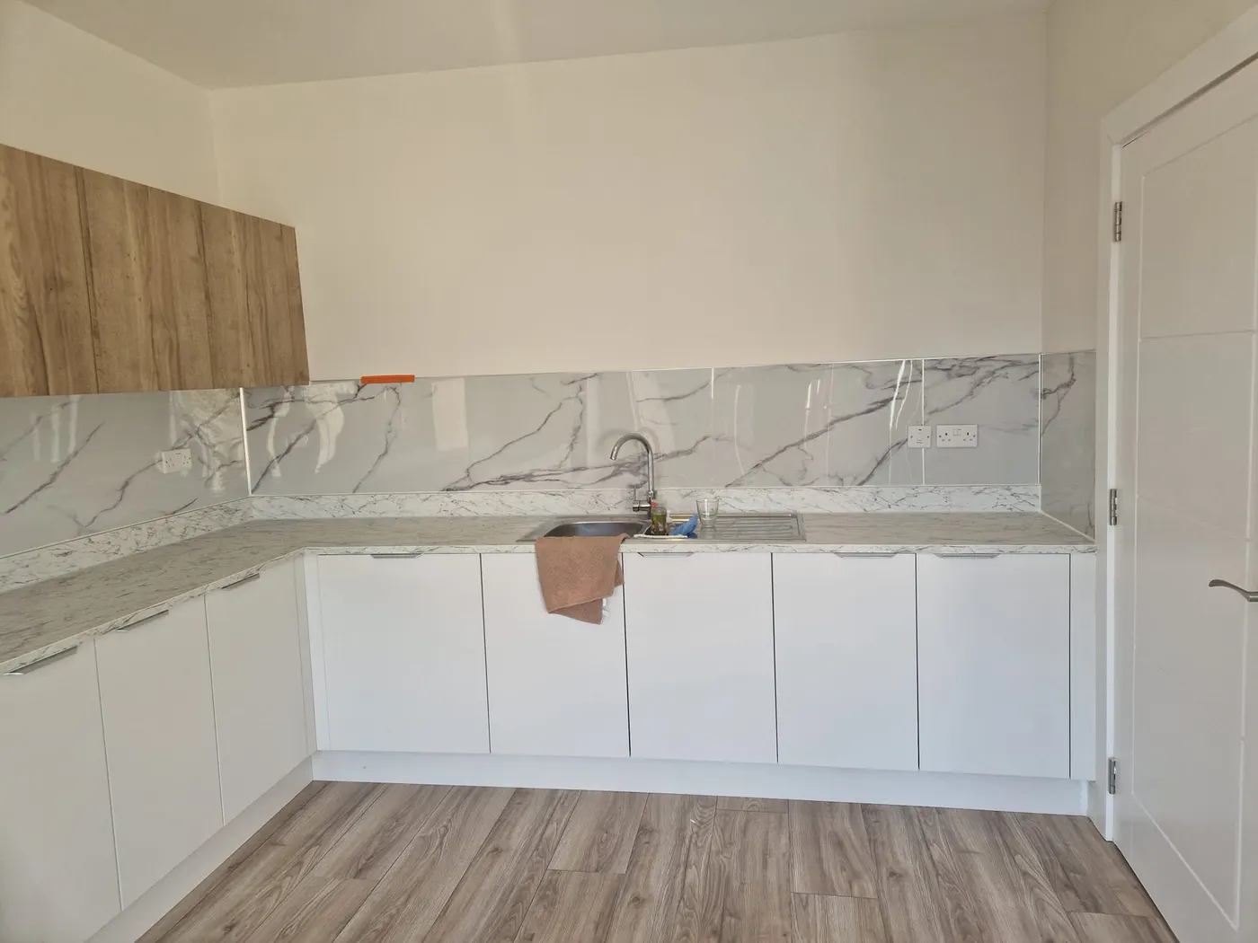 White and Grey Wall Panel installed in the kitchen