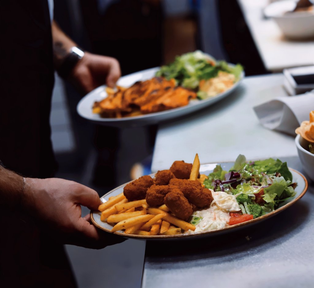 Scampi and salad served