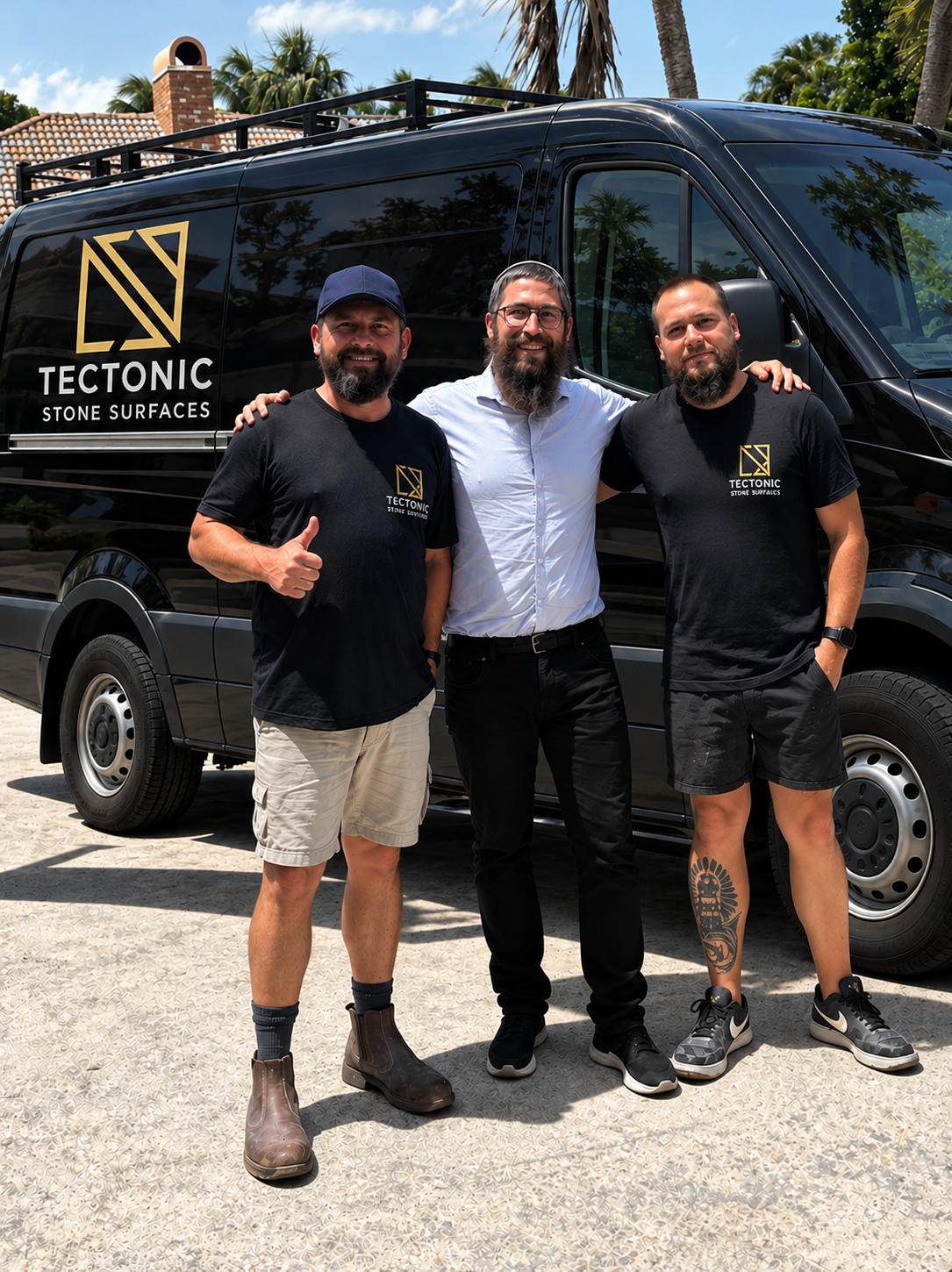 Tectonic Stone Surfaces team in front of the company van